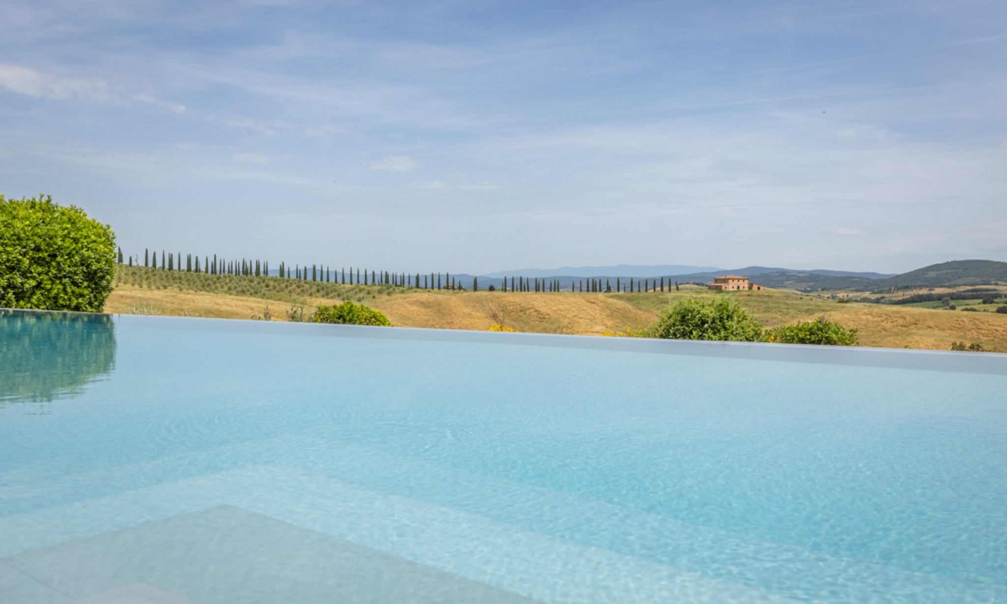 luxury house with infinity swimming pool and garden
